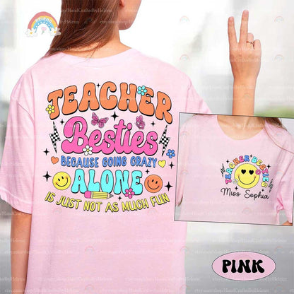 TEACHER BESTIES boldly presented in a mix of orange and pink letters, adorned with playful elements like butterflies and a pencil, and a humorous message that adds a touch of lightheartedness to the profession.