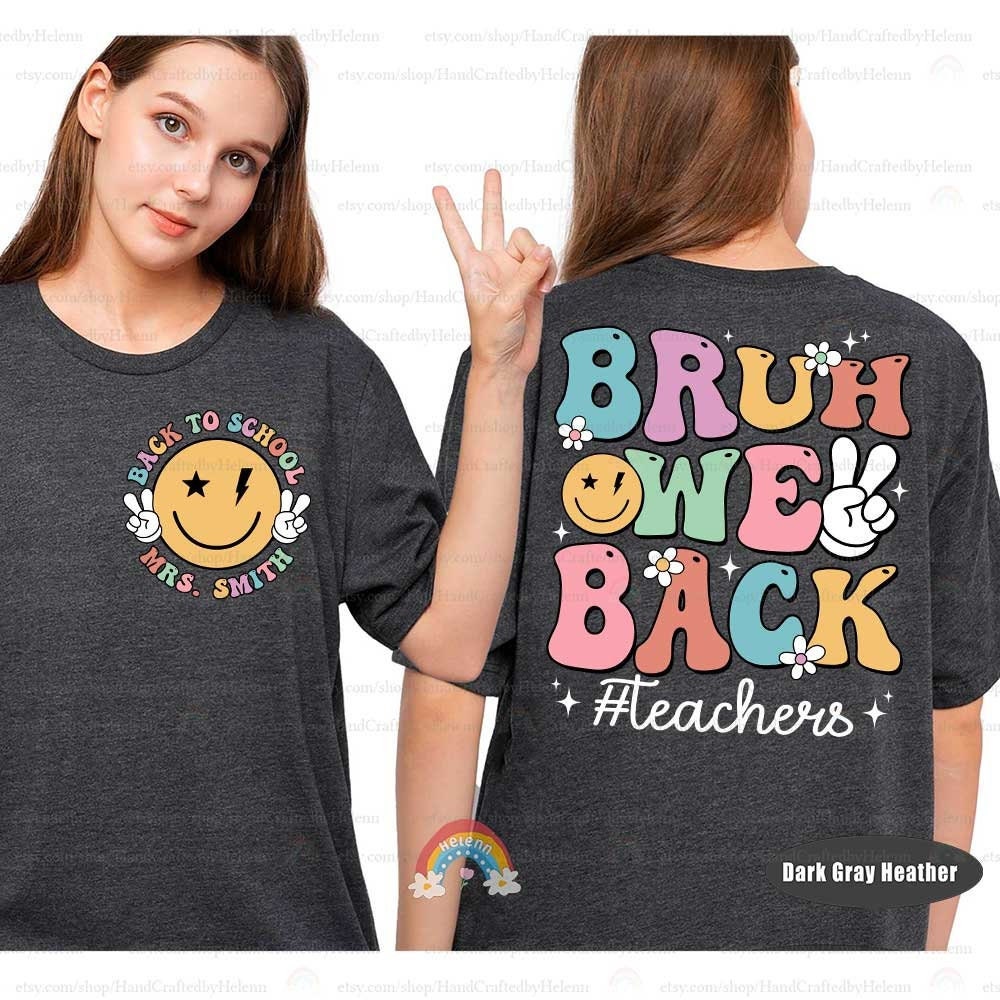 A casual white t-shirt with a joyful expression on the front, stating Back to School Mrs. Smith within a smiling face design, and an energetic message on the back suited for educators.