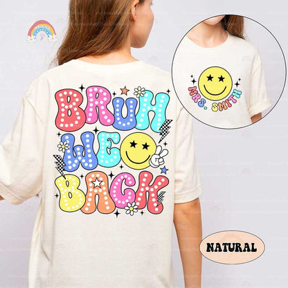 A back-to-school inspired artwork with a mix of fun, patterned letters spelling out Bruh We Back, highlighted by a happy, star-eyed smiley face and whimsical flower designs.