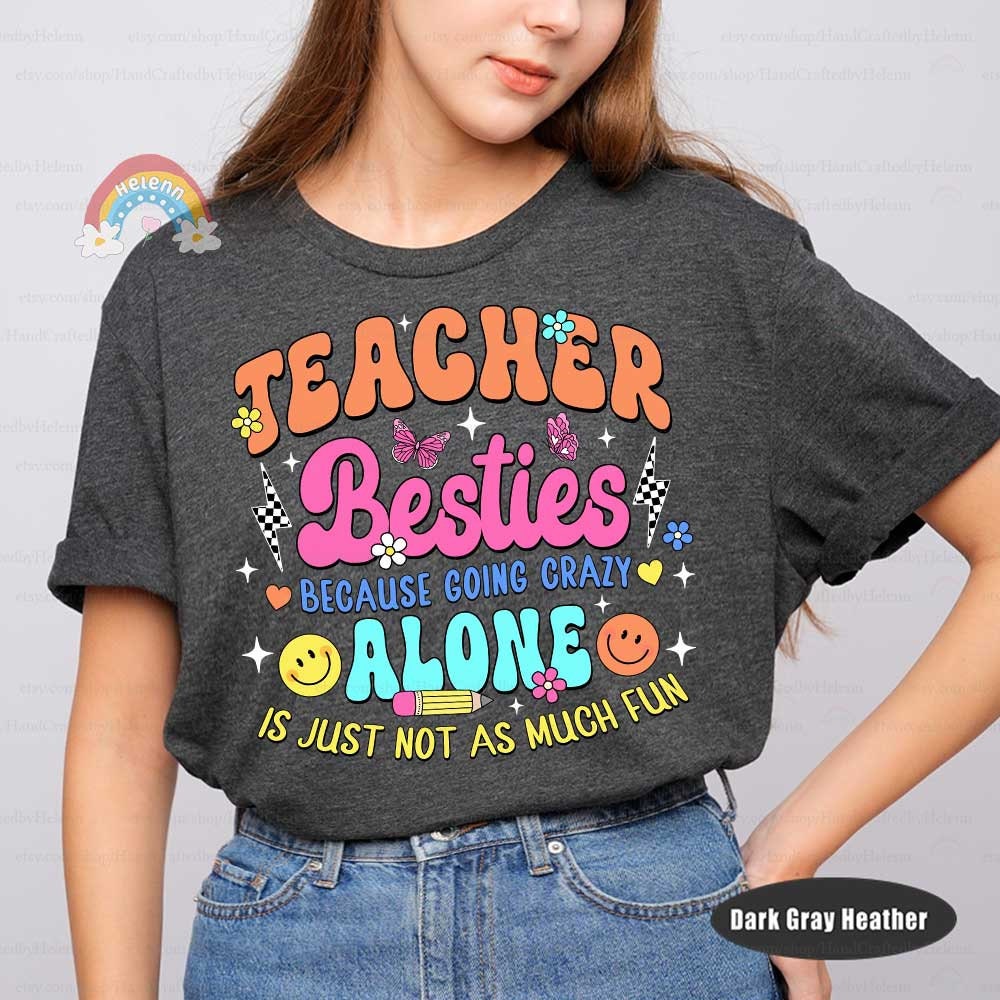 blend of bright colors to spell TEACHER BESTIES, decorated with delightful symbols of happiness and teamwork, like butterflies and smiling faces, highlighting the lighter, more enjoyable aspects of teaching with a humorous twist in the message.