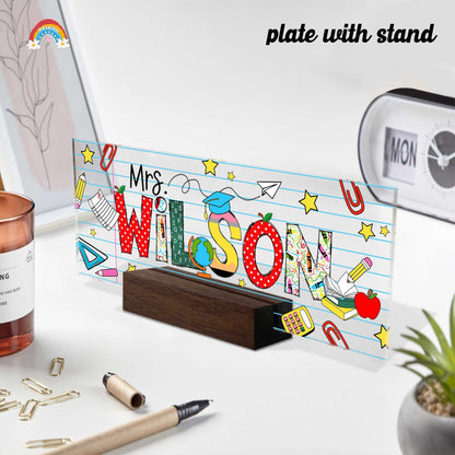 The backdrop of the name block features a soft, pastel-striped pattern, adorned with doodles of stars and paper airplanes that add a playful, creative flair.