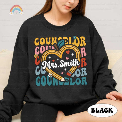 A bright and inviting illustration that combines symbols of love and education, with the word COUNSELOR repeated around a heart-shaped apple, symbolizing the passion and care in Mrs. Smith’s work.