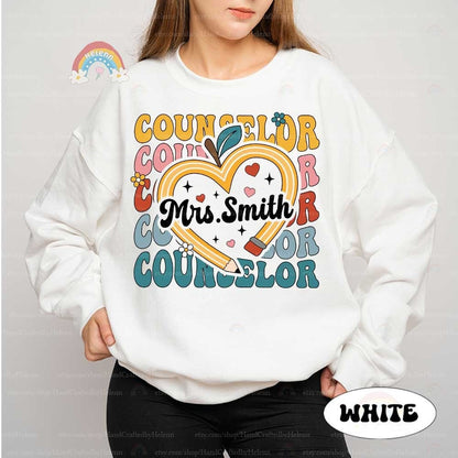 A vibrant and colorful graphic showcasing the title COUNSELOR interwoven around a large, heart-shaped apple, emphasizing Mrs. Smith&#39;s nurturing role in education.