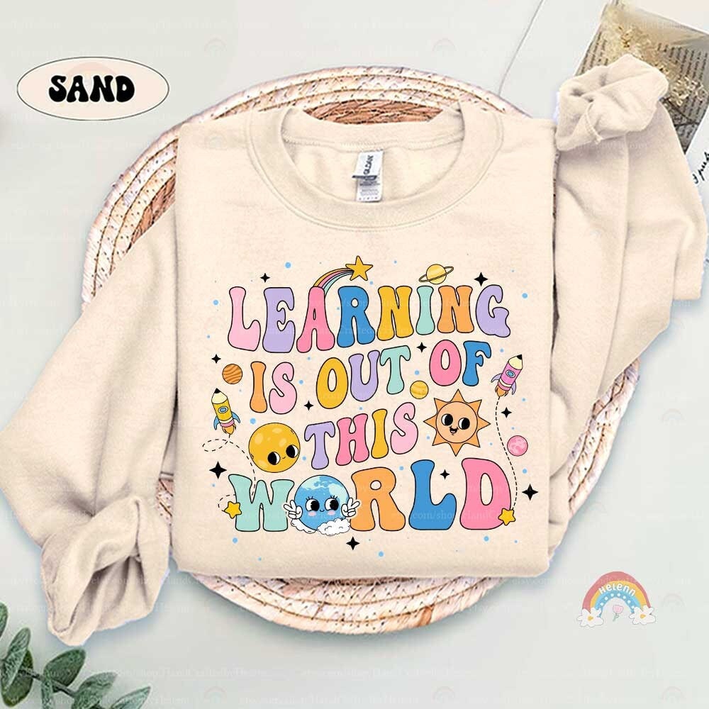 Bright and cheerful artwork illustrating the joy of discovery in learning, with playful space elements including a rocket and a friendly Earth character.