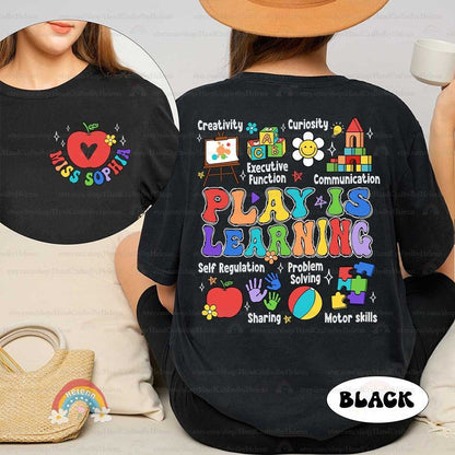 A vibrant display emphasizing that play contributes to education, adorned with an array of cheerful illustrations like a jigsaw puzzle, handprints, and a classic beach ball, each representing different aspects of playful learning.