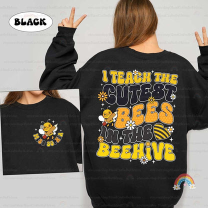 A creative and cute representation of a teaching theme, featuring a musically inclined bee character, vibrant yellow text, and decorative elements like flowers and a honeycomb heart.