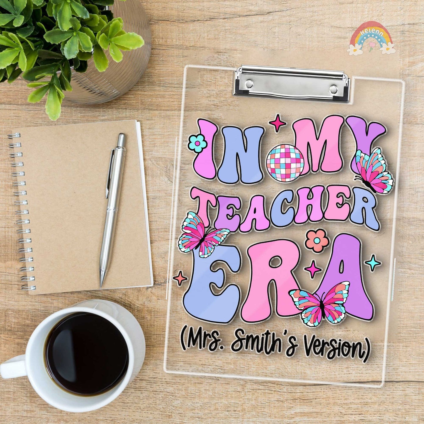 A custom teacher&#39;s clipboard designed with a bright and cheerful color palette, displaying Mrs. Smith&#39;s version of her teaching era, decorated with floral elements and lively butterfly illustrations.