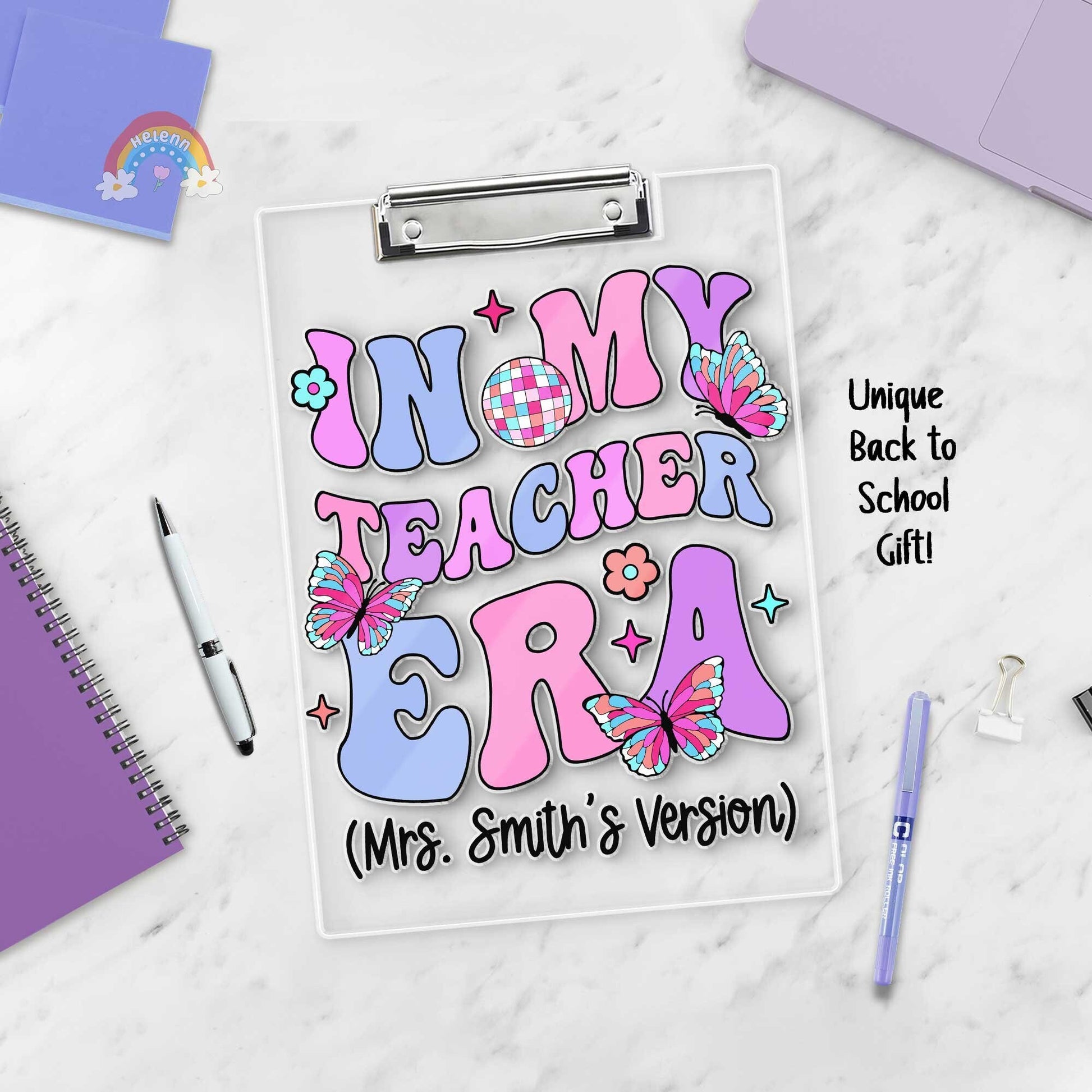 A vibrant clipboard design with bold, colorful lettering that celebrates a personalized teacher era, featuring playful butterflies and floral motifs, ideal for a dynamic educator named Mrs. Smith.