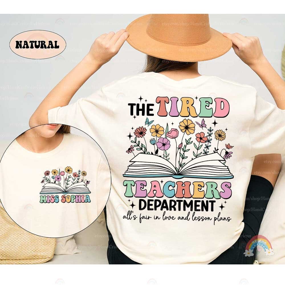 A playful yet expressive design that captures the exhaustion of teaching with TIRED TEACHERS written in bold, colorful letters, underscored by floral and butterfly motifs which add a touch of whimsy and brightness to the theme.