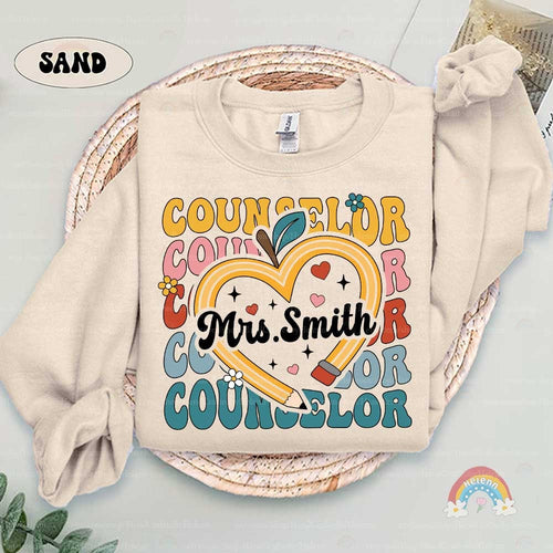 Artistic representation of a counselor's influence, featuring the name Mrs. Smith enveloped by a heart-formed apple and decorative elements, celebrating her commitment to student well-being.