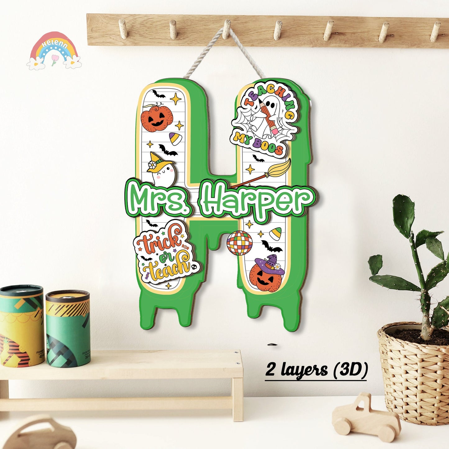 This creative door sign for Mrs. Wilson’s classroom combines charming Halloween characters and bold, cheerful fonts, adding a whimsical touch to the classroom entrance.