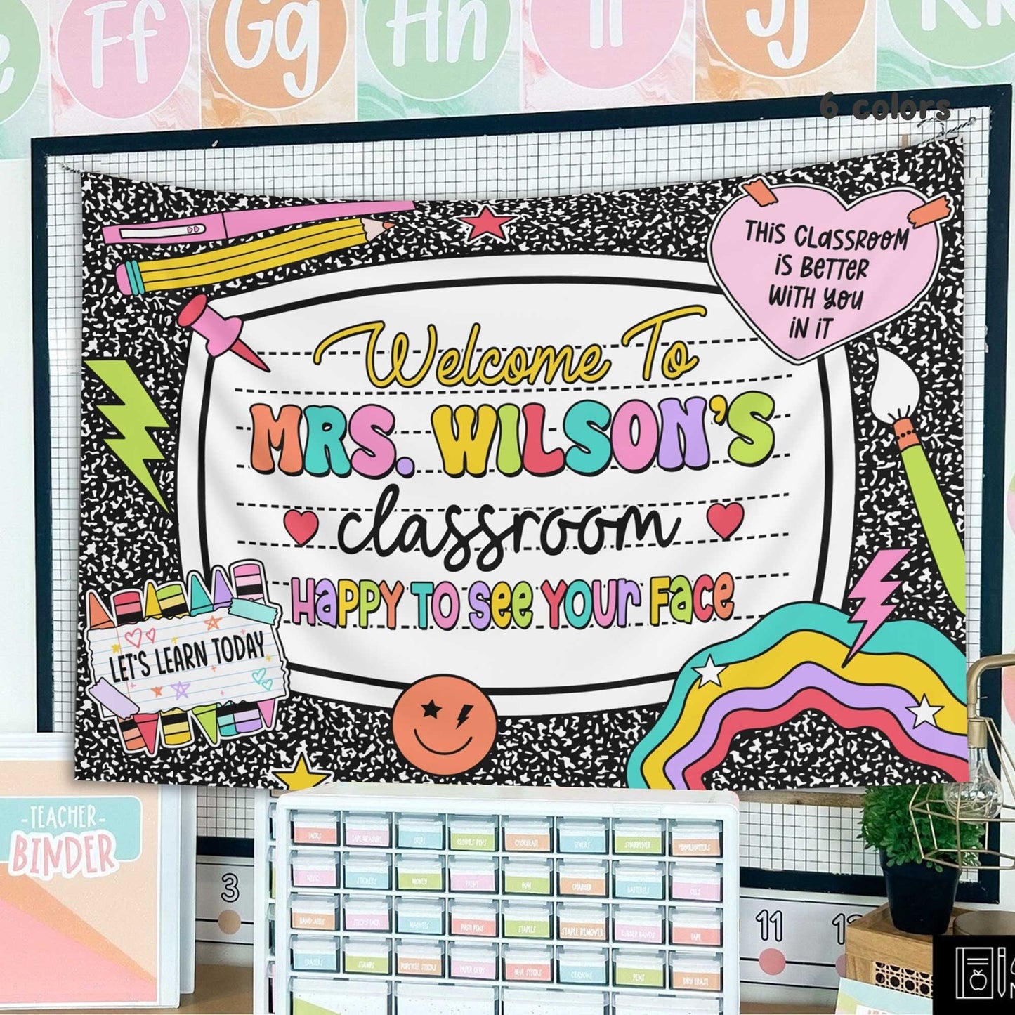 The design showcases a black-and-white notebook pattern with bold, pastel-colored text and fun classroom-themed illustrations.