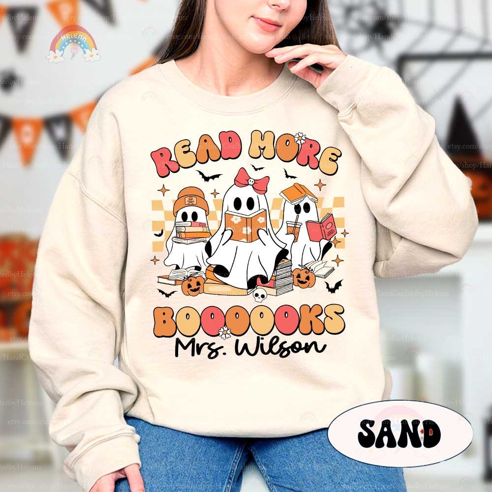 Colorful illustration shows three friendly ghosts with Halloween-themed decorations promoting reading.