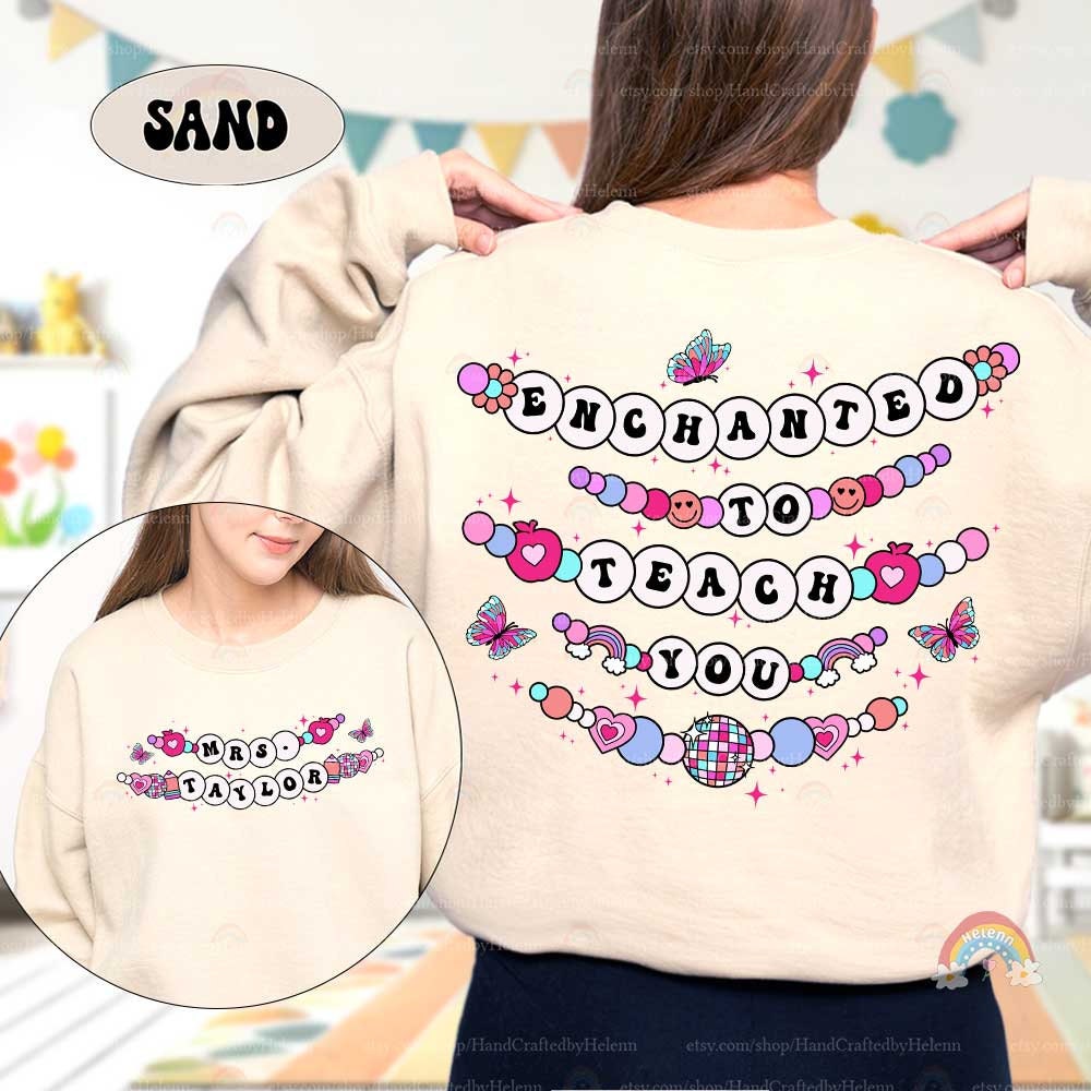 Delightful and colorful, this T-shirt design features the phrase Enchanted to Teach You, surrounded by beaded elements, butterflies, and hearts. The custom name on the front adds a charming and personal touch to this enchanting theme.