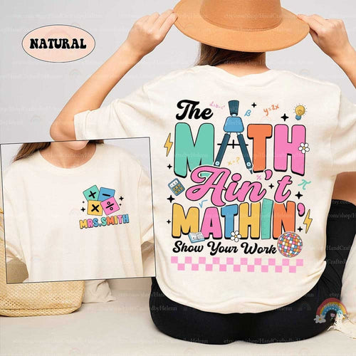 A playful design featuring the phrase The math ain't mathin' with colorful letters and math-themed icons like a compass and calculator plus Show your work below.