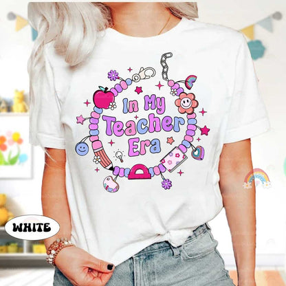 Colorful and cute, this T-shirt design with In My Teacher Era surrounded by a playful beaded bracelet and whimsical charms captures the essence of a joyful teaching journey.