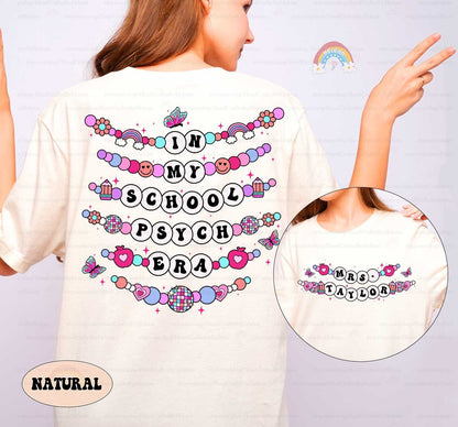 A vibrant graphic displaying In My Educator Era in beaded-style letters, surrounded by whimsical elements like smiley faces, apples, and a disco ball, all on a pink backdrop.