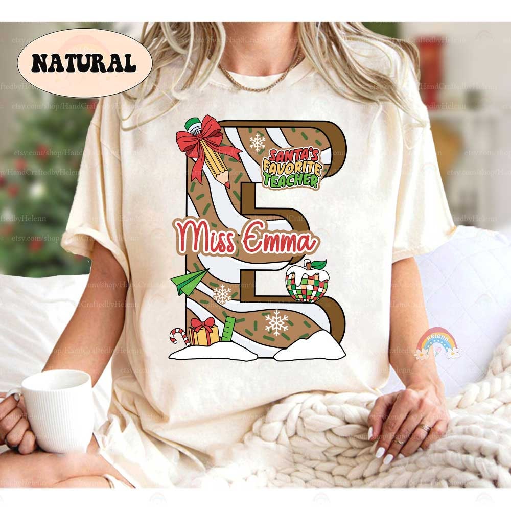 Cheerful holiday design showcasing a bold, personalized letter adorned with festive elements like candy canes, snowflakes, and Christmas lights. The personalized name, like Miss Sophia or Miss Emma, adds a thoughtful touch perfect for holiday season.