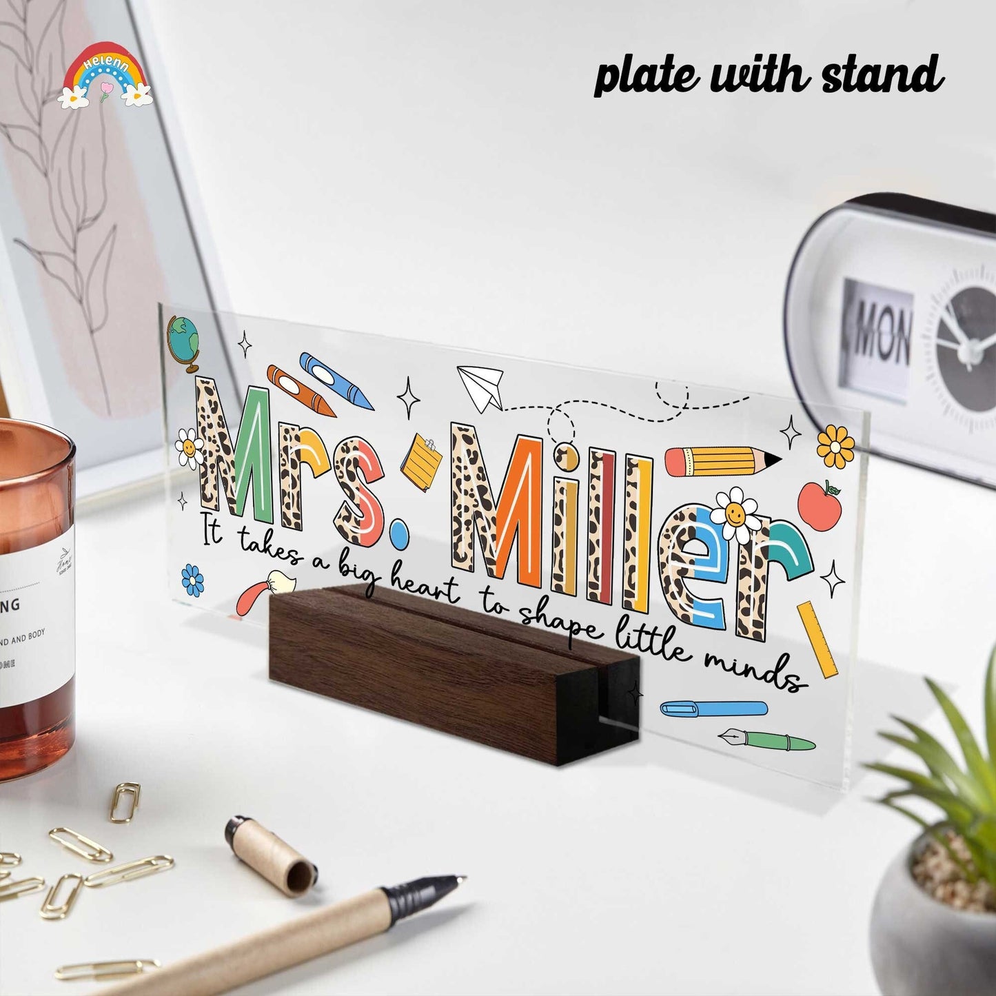 This teacher appreciation plate presents a colorful and creative design, combining vibrant lettering with illustrations of school-related items and a heartfelt quote about the impact of teaching.
