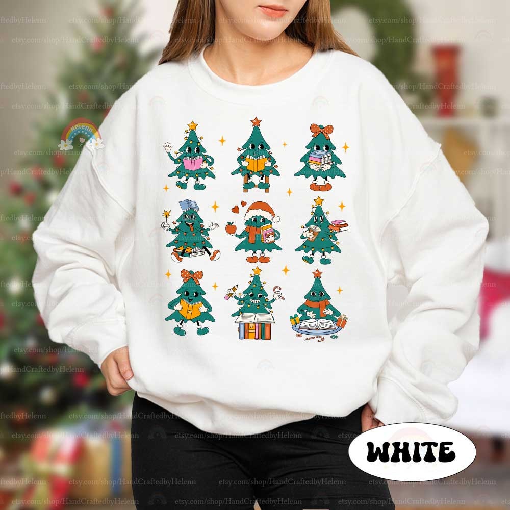 Cheerful and fun T-shirt featuring Christmas tree characters in various learning poses, surrounded by stars and festive elements. The playful design brings together education and holiday spirit.