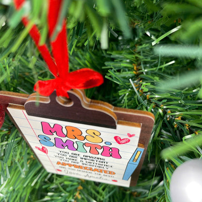Playful teacher ornament shaped like a clipboard, featuring vibrant colors and a sweet appreciation message for Mrs. Smith. The personalized note from Love, Amelia adds an extra special touch to this thoughtful gift.