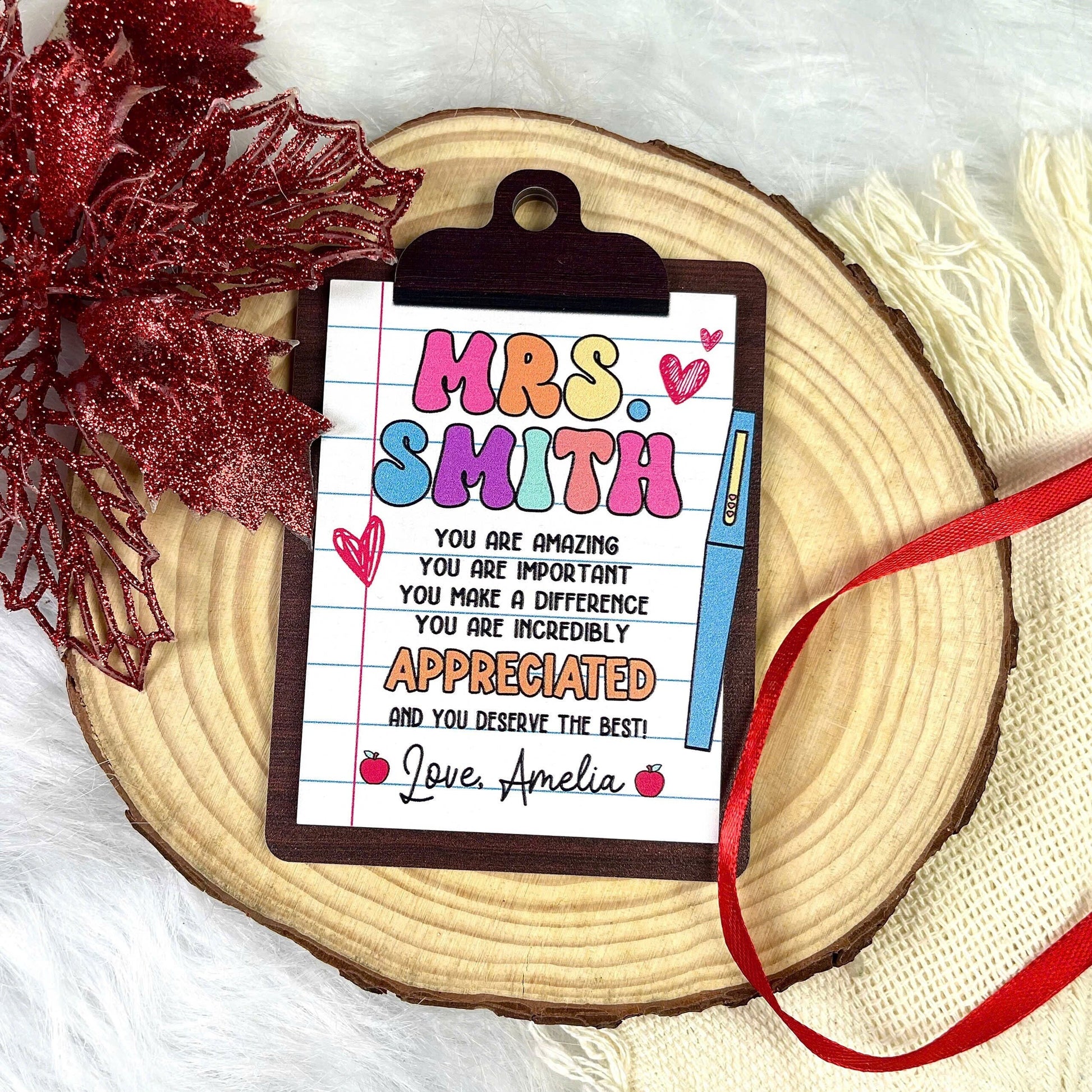 Charming clipboard-shaped ornament featuring a heartfelt message for Mrs. Smith, personalized with Love, Amelia. The colorful design highlights appreciation and gratitude, making it a perfect gift for teachers.