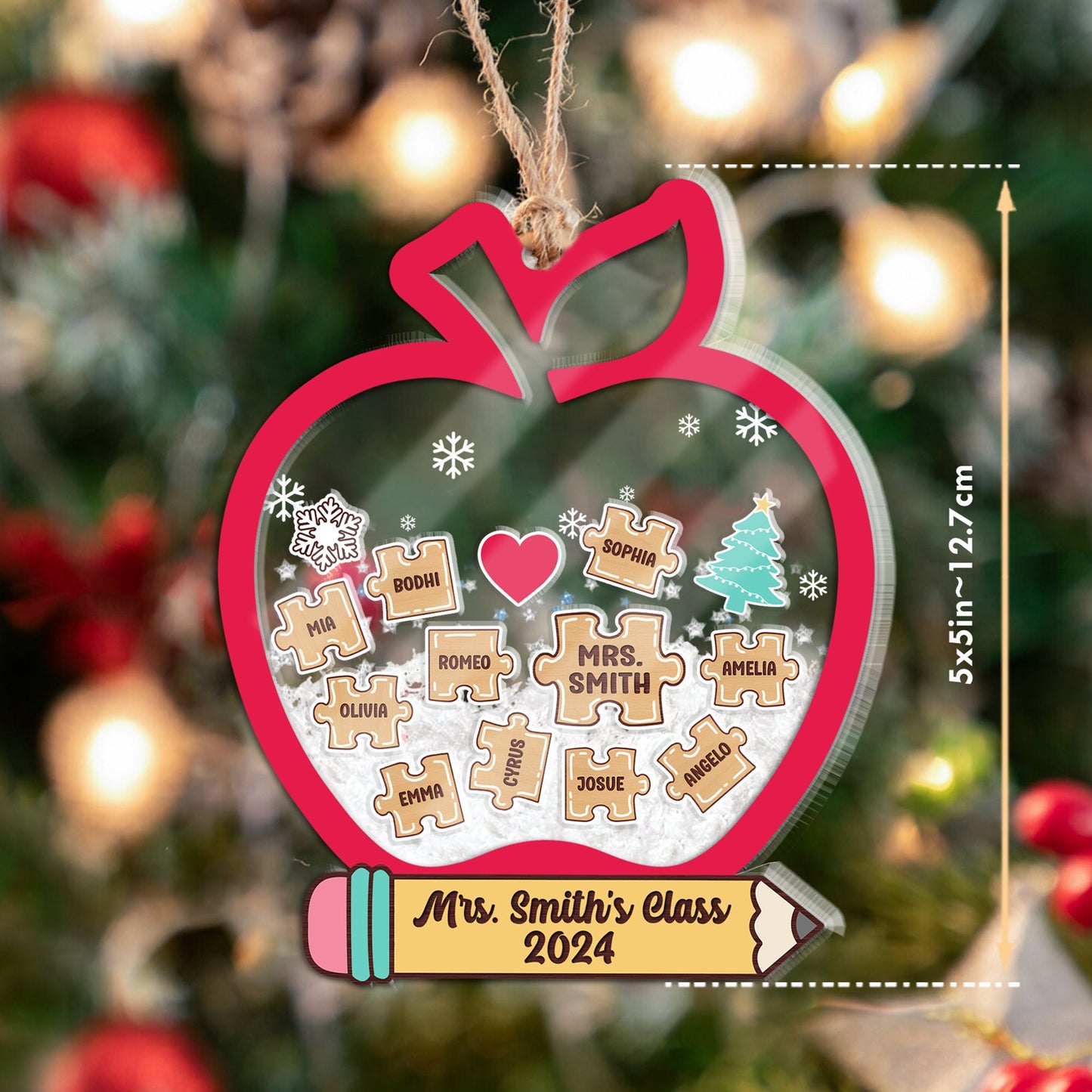 This personalized teacher ornament features an apple design with puzzle pieces for each student in Mrs. Smith’s Class 2024. The interactive shakeable snow adds extra charm to this thoughtful holiday gift.