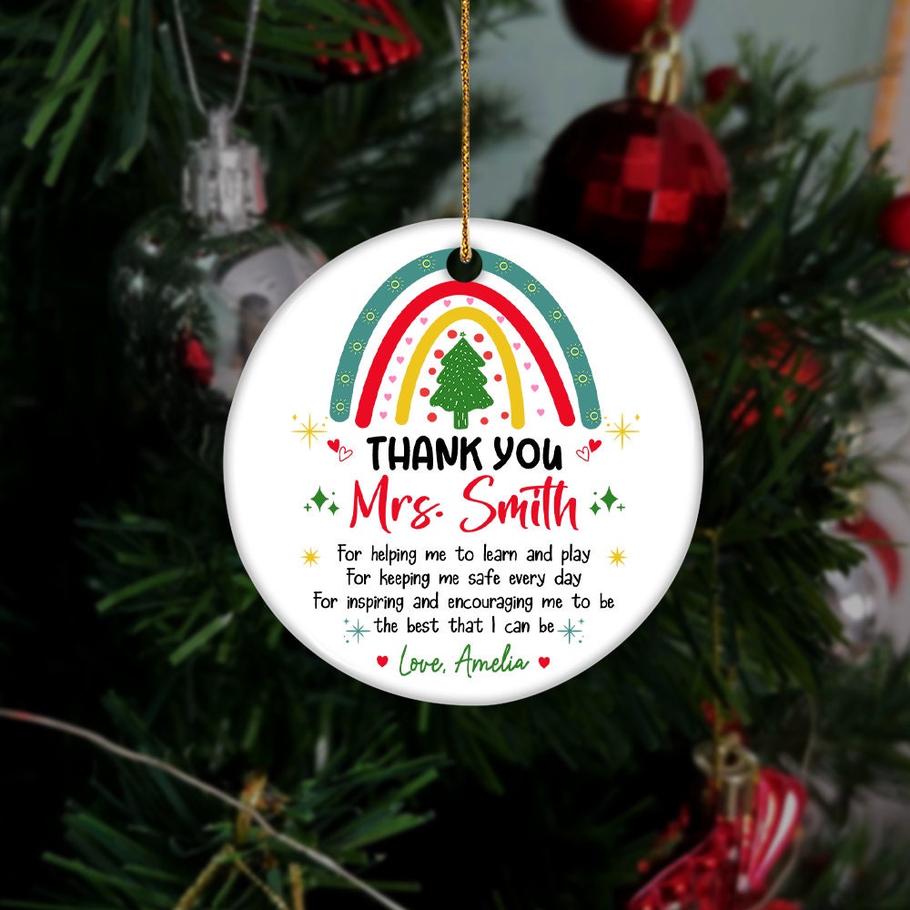 Whimsical ornament featuring a bright rainbow and a thank-you note for Mrs. Smith, personalized with Love, Amelia. A beautiful way to show appreciation during the holiday season.