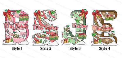 Cheerful holiday design showcasing a bold, personalized letter adorned with festive elements like candy canes, snowflakes, and Christmas lights. The personalized name, like Miss Sophia or Miss Emma, adds a thoughtful touch perfect for holiday season.