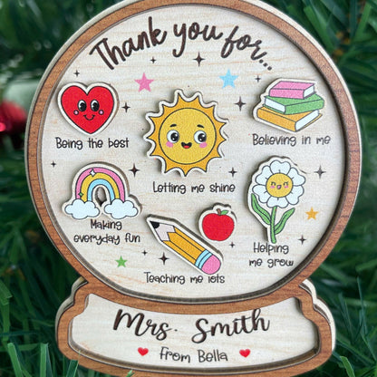 Playful and thoughtful ornament featuring a thank-you message to Mrs. Smith, personalized from Bella. With cute icons like a sun and pencil, it’s a perfect teacher appreciation gift for the holidays.