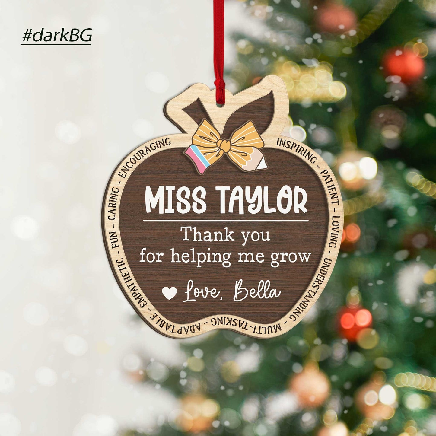 Beautifully crafted wooden ornaments shaped like apples, personalized with a teacher&#39;s name and a thank-you message from a student. Perfect for showing appreciation with a personal touch during the holidays.