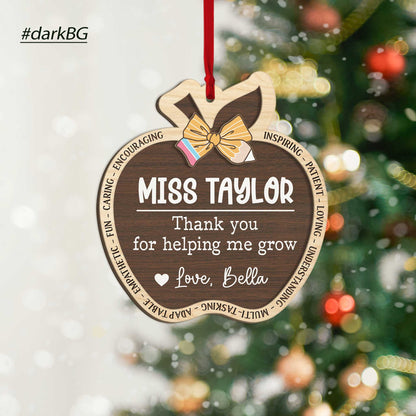 Beautifully crafted wooden ornaments shaped like apples, personalized with a teacher&#39;s name and a thank-you message from a student. Perfect for showing appreciation with a personal touch during the holidays.