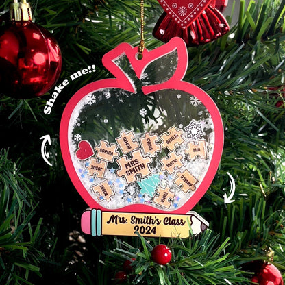 Adorable apple-shaped ornament personalized with Mrs. Smith’s Class 2024, featuring puzzle pieces with student names and a shakeable snow effect. A delightful keepsake for teachers to remember their class.