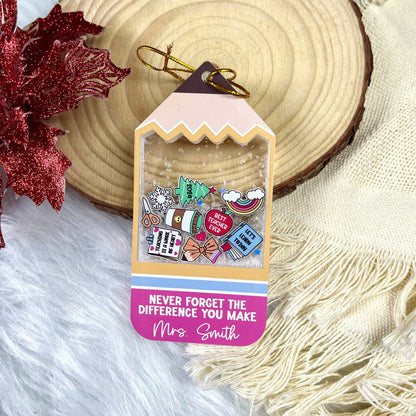 Charming and festive tag-shaped ornament personalized for Mrs. Smith, featuring colorful icons and a shakeable snow effect. The heartfelt message adds a personal touch, making it an ideal holiday gift for teachers.