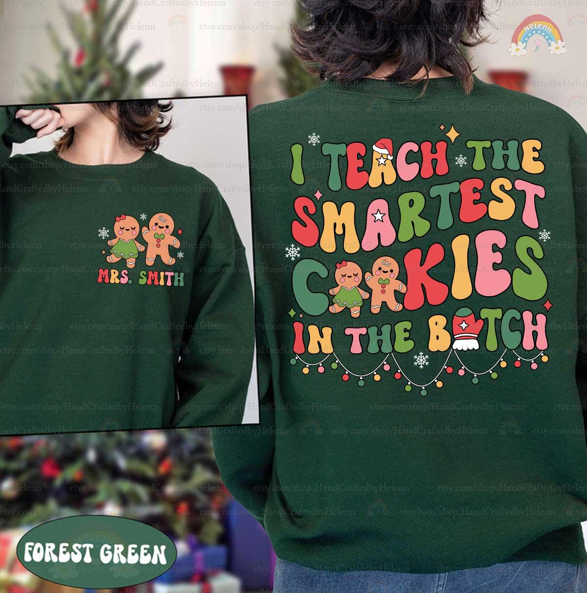 Festive gingerbread-themed shirt with the phrase I Teach the Smartest Cookies in the Batch, personalized for Mrs. Smith, making it a perfect holiday gift for teachers.