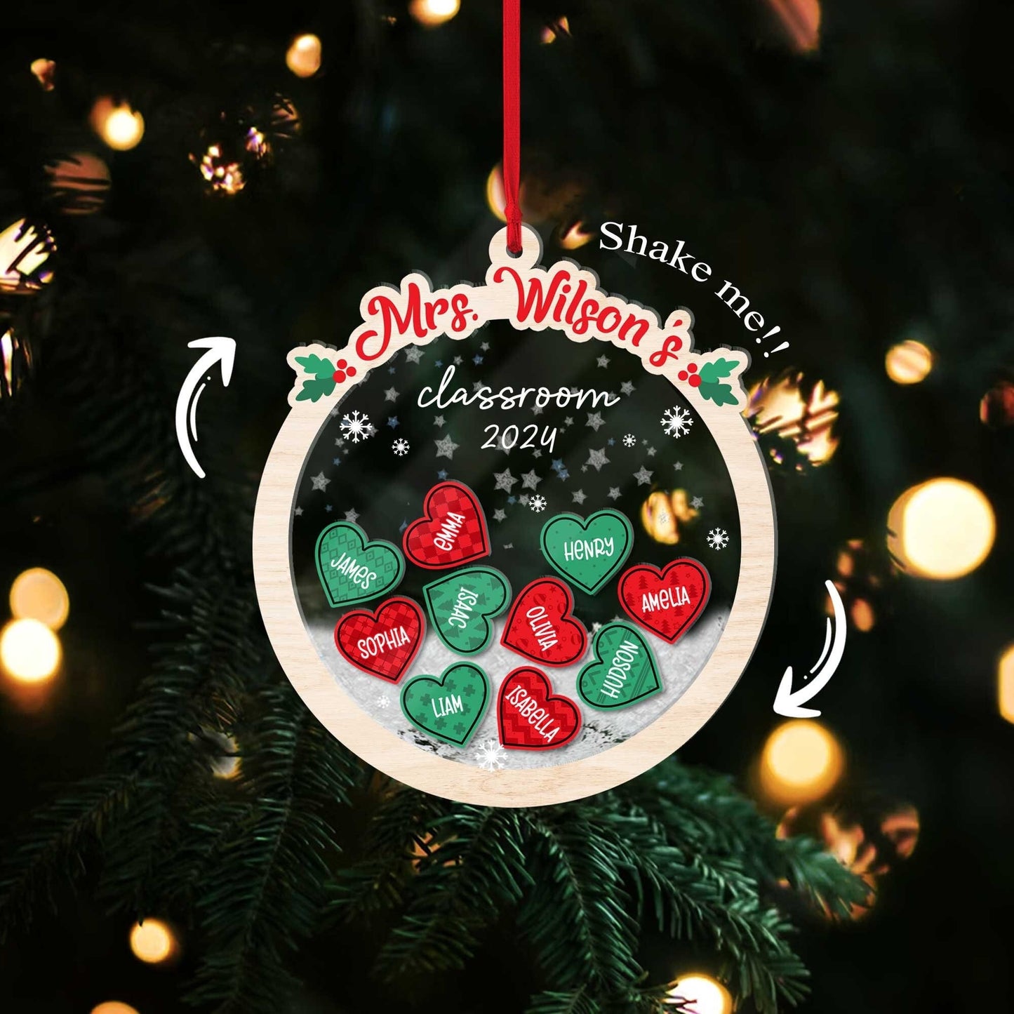 Charming round ornament personalized with Mrs. Wilson’s classroom and the year 2024, featuring heart-shaped student names and a shakeable snow effect. A perfect holiday keepsake to celebrate the class.