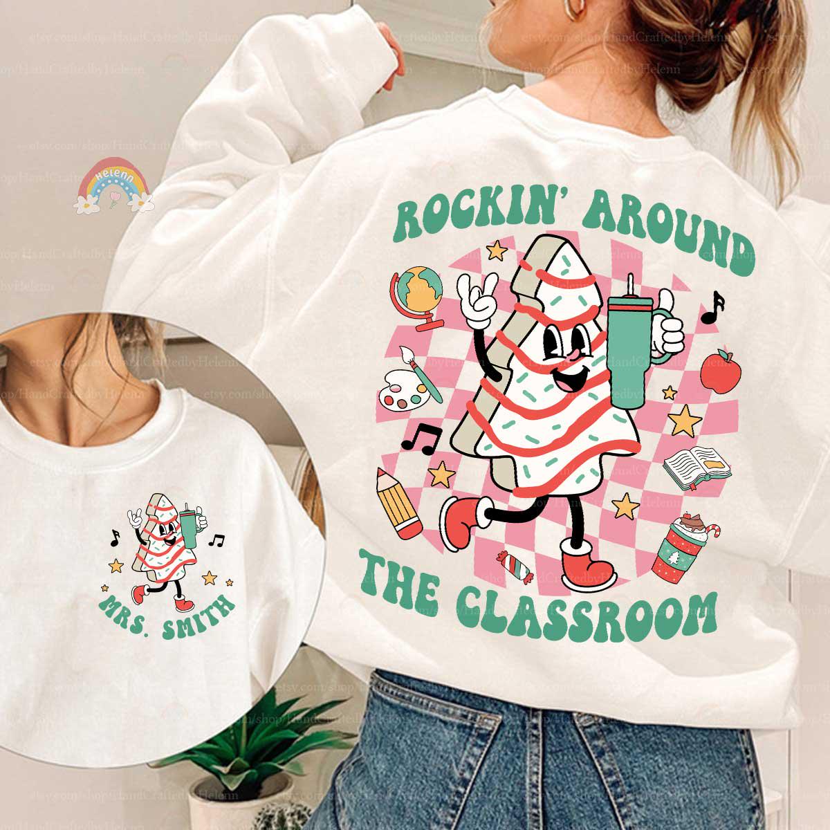 Holiday-themed teacher shirt featuring a joyful tree rocking around the classroom, perfect for spreading seasonal joy.