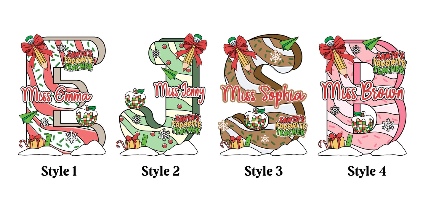 Charming ornament showcasing a bold initial design adorned with Christmas elements like bows, candy canes, and gifts. Each ornament is personalized with a teacher’s name, such as Miss Roberts or Miss Emma, making it a thoughtful holiday gift.