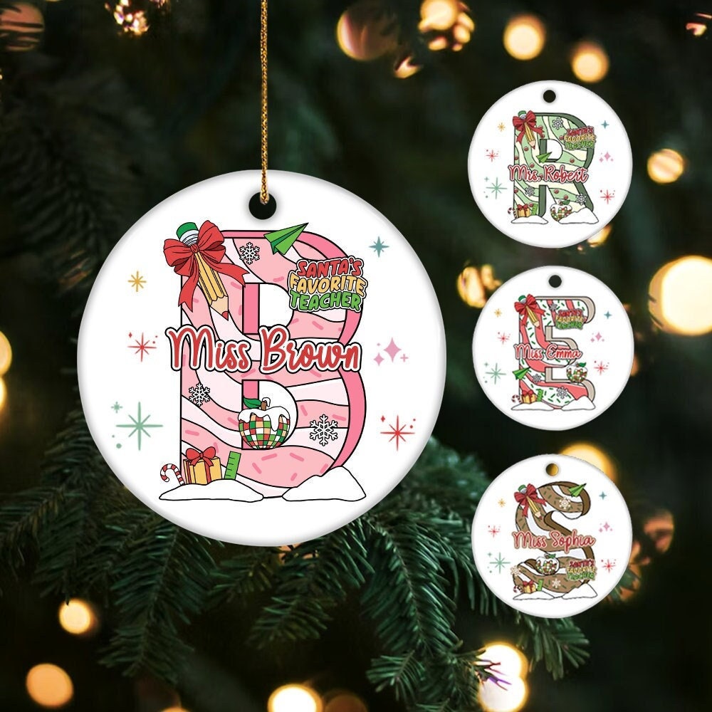 Festive and colorful ornament featuring a large initial filled with holiday decorations, personalized with Miss Brown’s name and the playful phrase Santa’s Favorite Teacher. A perfect holiday keepsake for teachers.