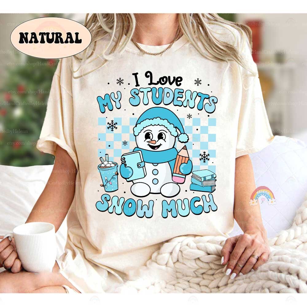 Festive winter-themed design showcasing a smiling snowman with school supplies and the heartwarming message I Love My Students Snow Much. A great holiday shirt for teachers.