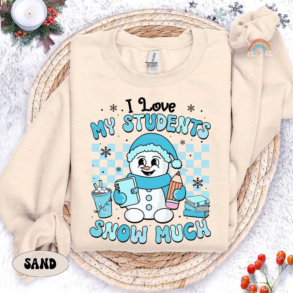 Fun and festive snowman-themed design with the phrase I Love My Students Snow Much, perfect for teachers to wear during the winter season.
