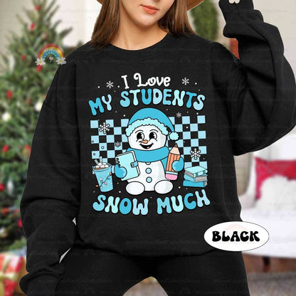 Festive winter-themed design showcasing a smiling snowman with school supplies and the heartwarming message I Love My Students Snow Much. A great holiday shirt for teachers.