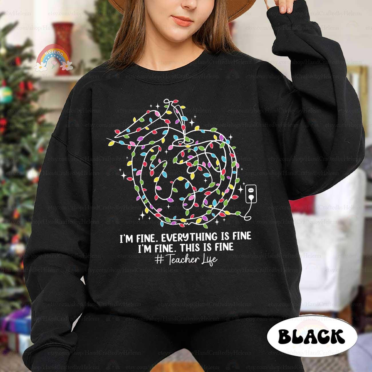 Fun and quirky, this design brings laughter with its colorful lights and #TeacherLife spirit, ideal for holiday wear.