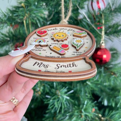 Whimsical ornament showing appreciation for Mrs. Smith with icons and messages like Letting me shine and Teaching me lots. Personalized from Bella, it’s a meaningful keepsake for the holiday season.