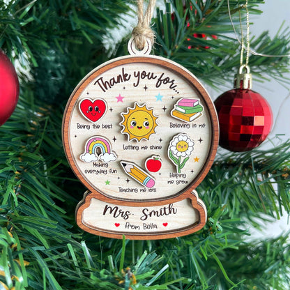 Charming ornament featuring colorful icons and a heartfelt thank-you message for Mrs. Smith, personalized from Bella. Each icon represents special traits like Believing in me and Helping me grow, making it a thoughtful teacher gift.