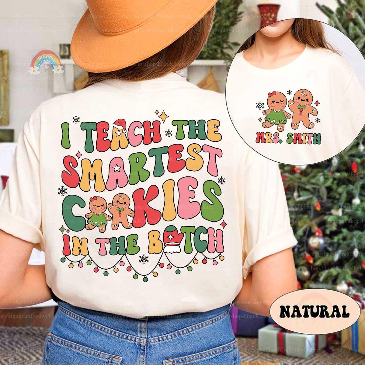 Playful holiday shirt featuring colorful gingerbread characters and the phrase I Teach the Smartest Cookies in the Batch, personalized with Mrs. Smith’s name.