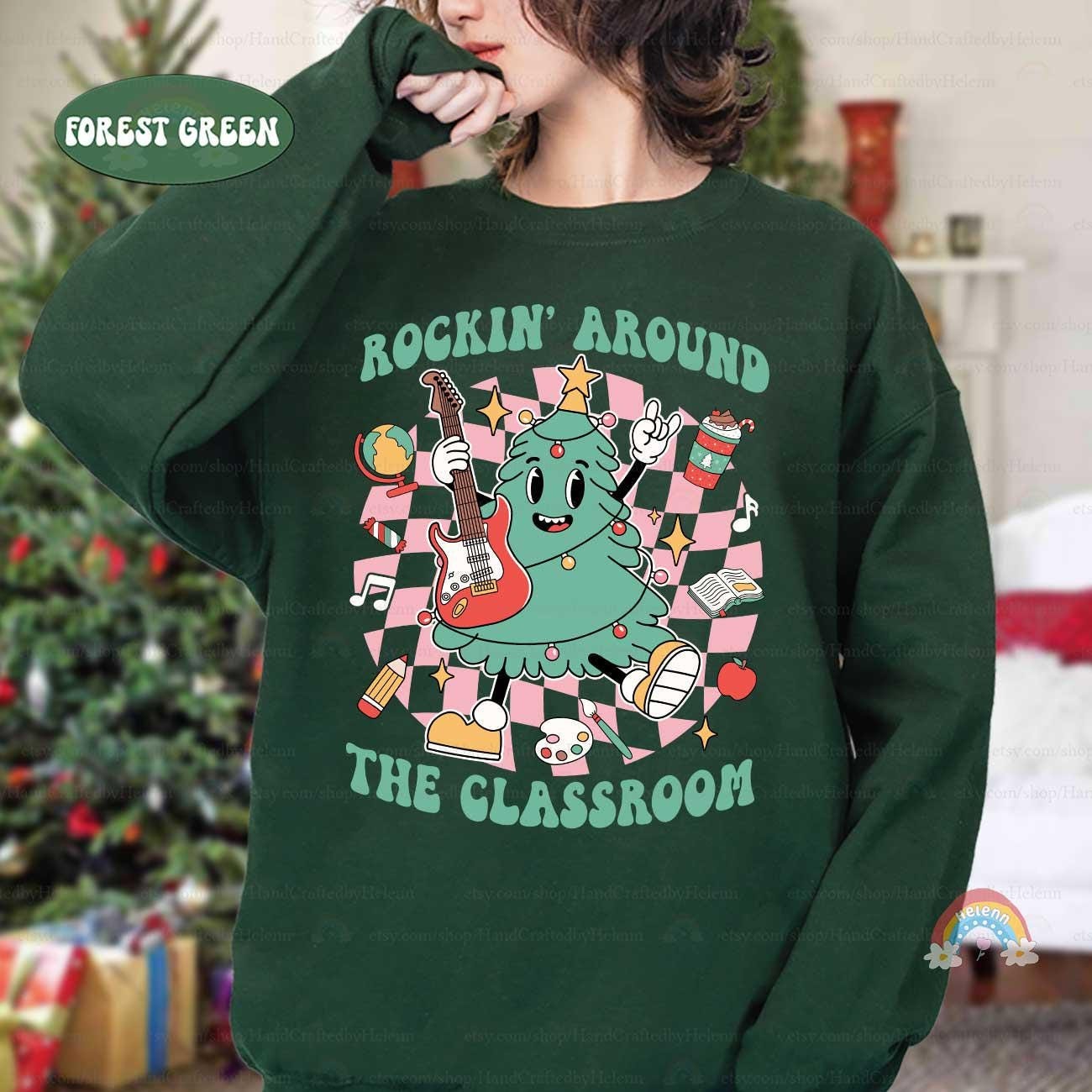 A fun-loving tree with a guitar and holiday icons makes this shirt a festive favorite for classroom celebrations.