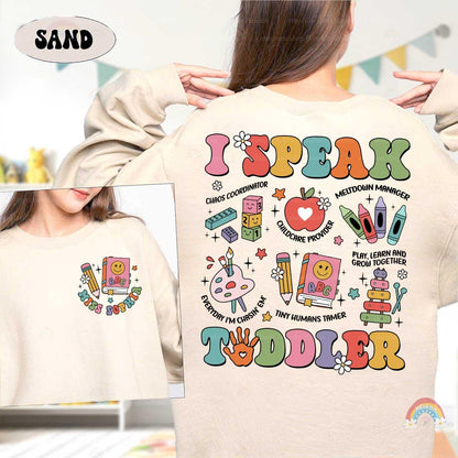 Showcase your toddler-wrangling superpowers with this fun and vibrant teacher tee.