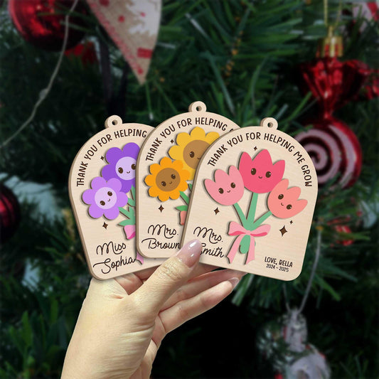 Show your gratitude with this charming floral ornament, perfect for the teacher who helps students bloom.