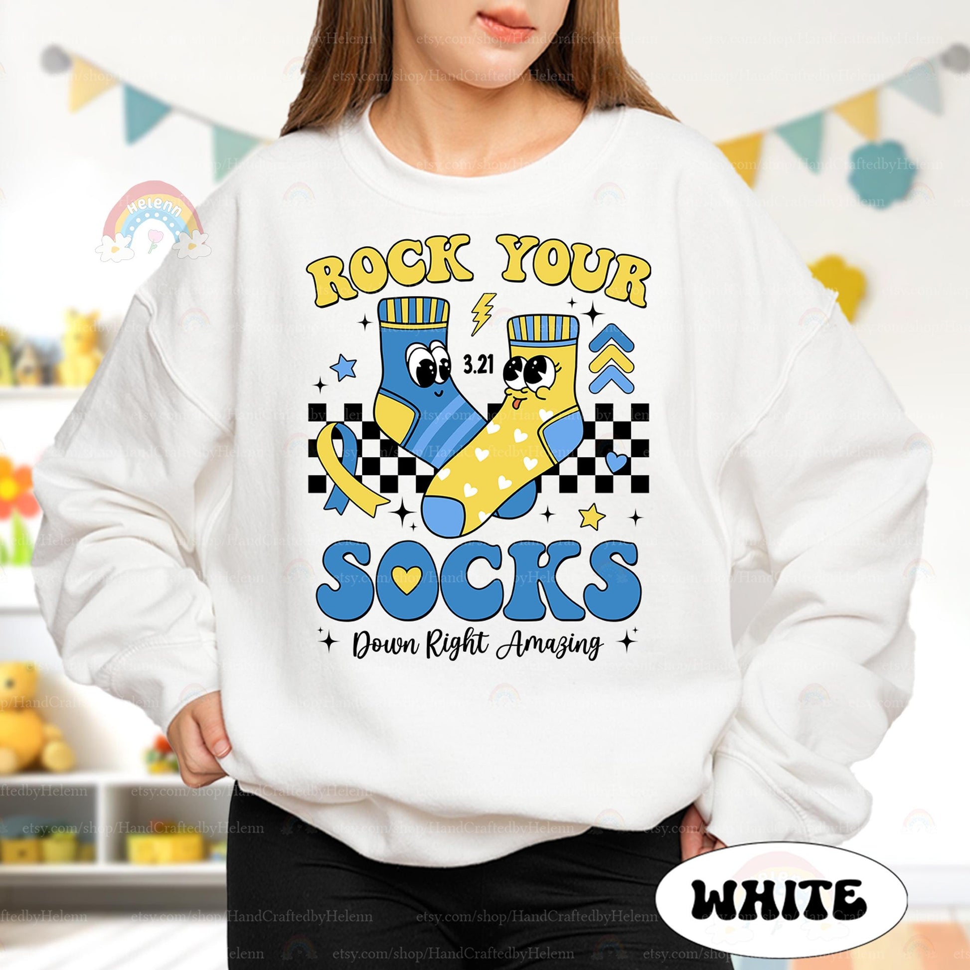 Designed for comfort and style, this T-shirt blends retro checkered vibes with modern positivity. Blue and yellow socks, lightning bolts, and a heartwarming message make it the perfect addition to any awareness event or casual outfit.